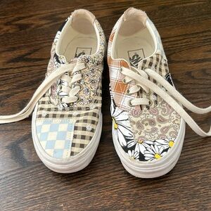 Patchwork Vans sneakers.